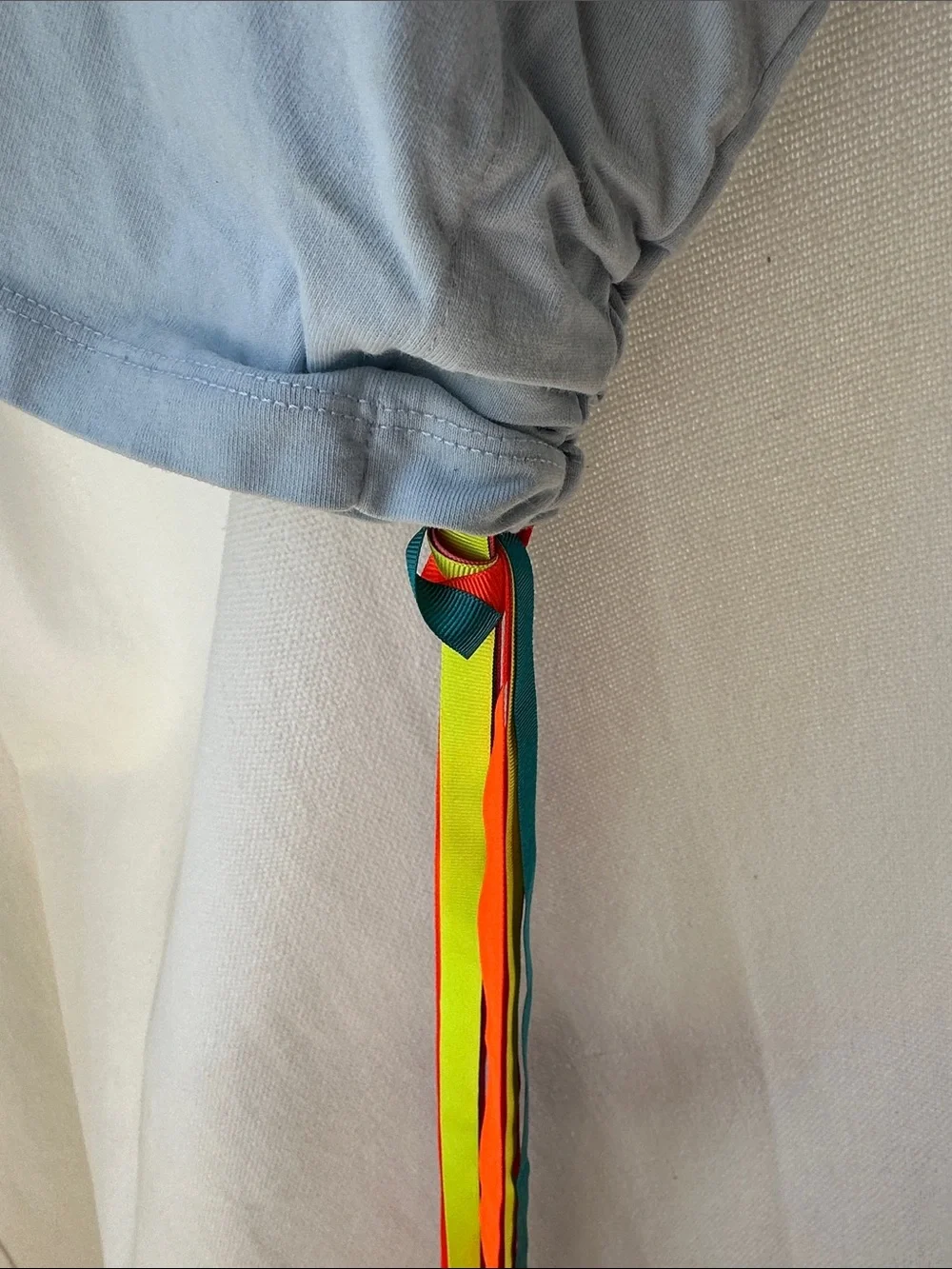 Mira Mikati Light Blue Tee with Teal, Orange & Pink Shoulder Stripes